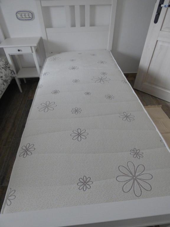Postel nebo postele na pokoji v ubytování Hisa STERNA - WELL HOUSE