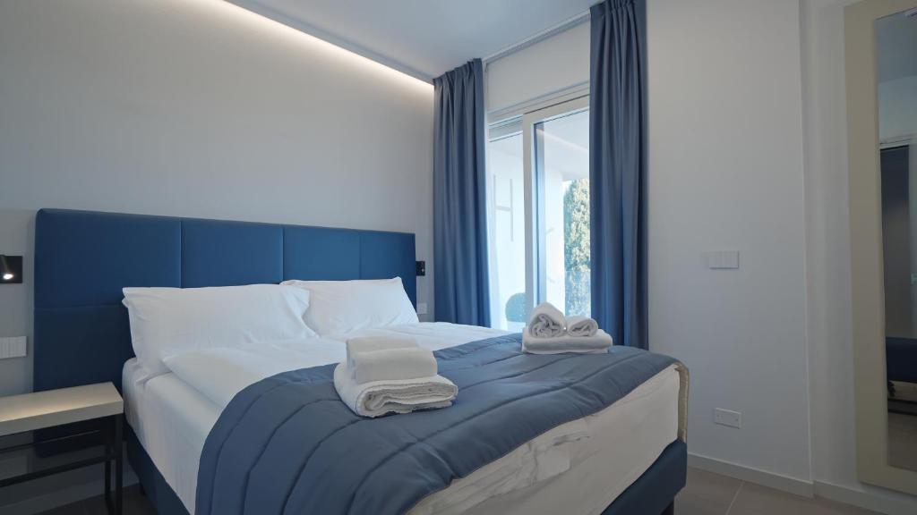 Postel nebo postele na pokoji v ubytování Hotel Cristal
