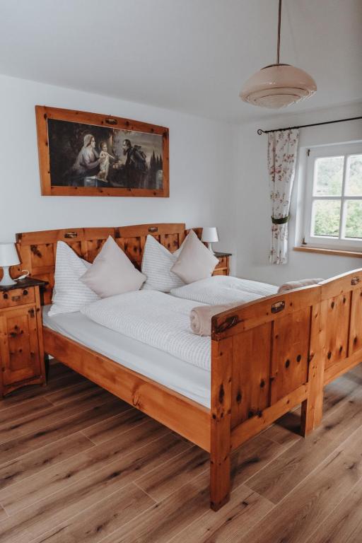 Postel nebo postele na pokoji v ubytování Hohlbichl Gut