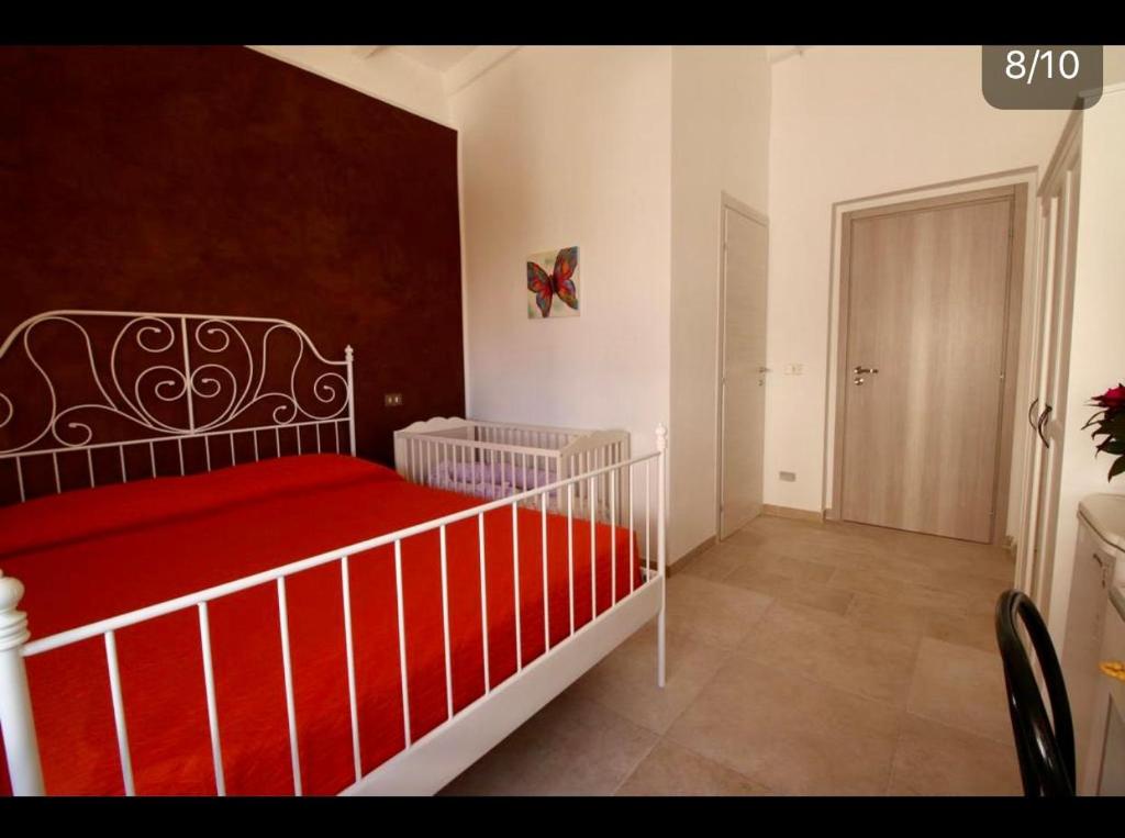 Postel nebo postele na pokoji v ubytování B&B Casa Biscotti