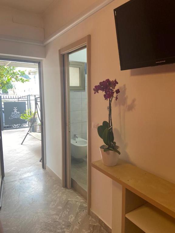 TV a/nebo společenská místnost v ubytování B&B Casa Biscotti