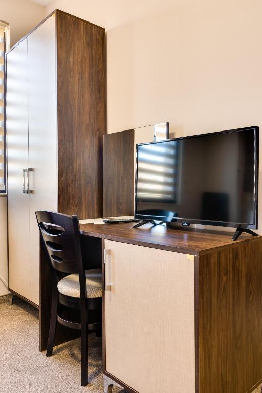 Kuchyň nebo kuchyňský kout v ubytování Family Hotel LILIUM