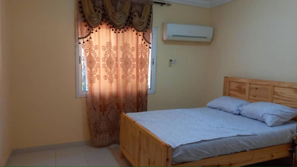 Postel nebo postele na pokoji v ubytování Gam Properties Guest House