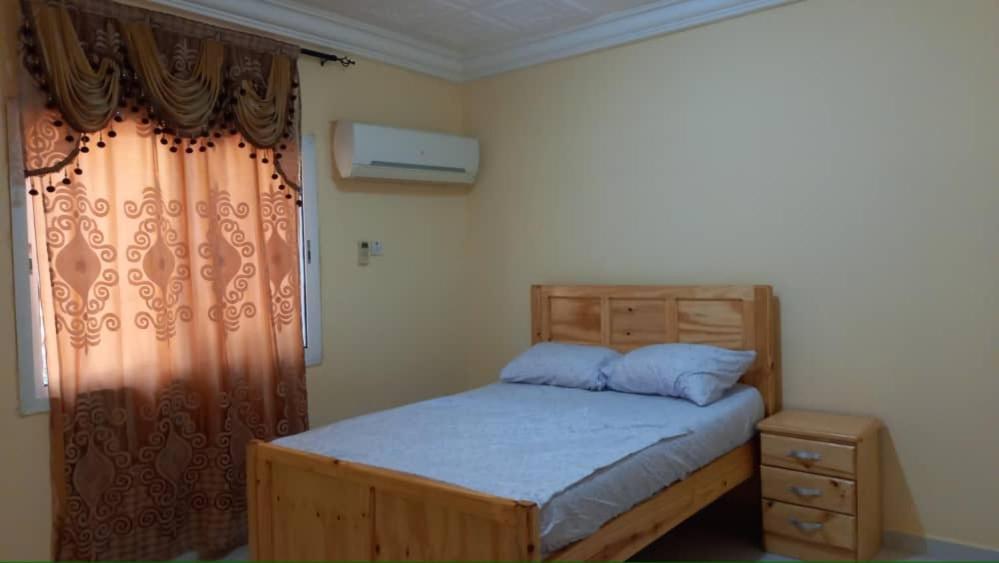 Postel nebo postele na pokoji v ubytování Gam Properties Guest House