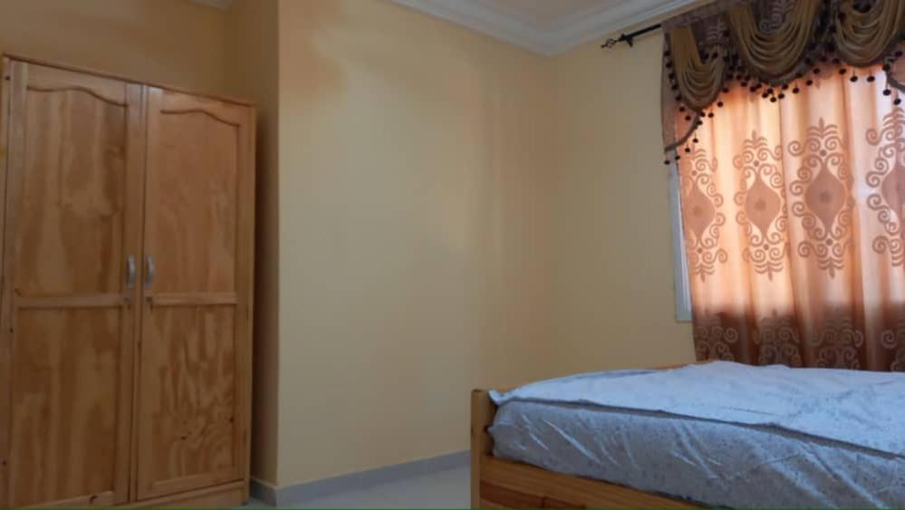 Postel nebo postele na pokoji v ubytování Gam Properties Guest House