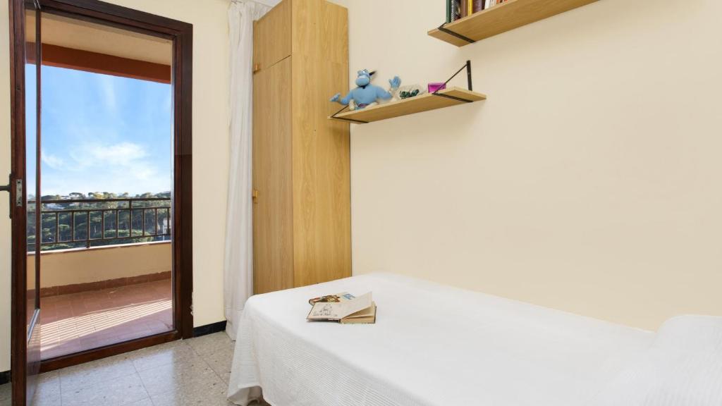 Posteľ alebo postele v izbe v ubytovaní 2Maer - Blanes