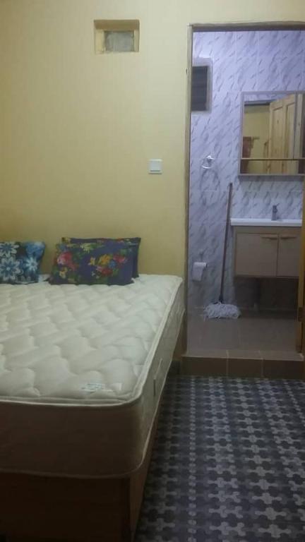 Postel nebo postele na pokoji v ubytování Gam Properties Guest House
