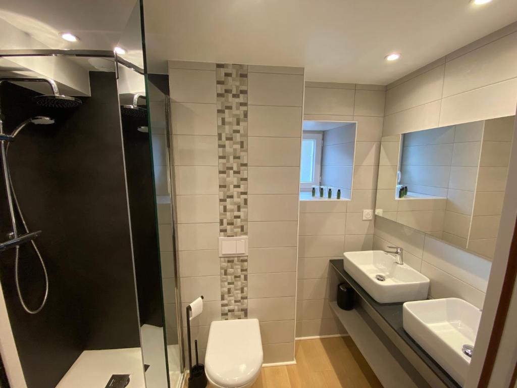 Koupelna v ubytování Hotel Restaurant Noblia