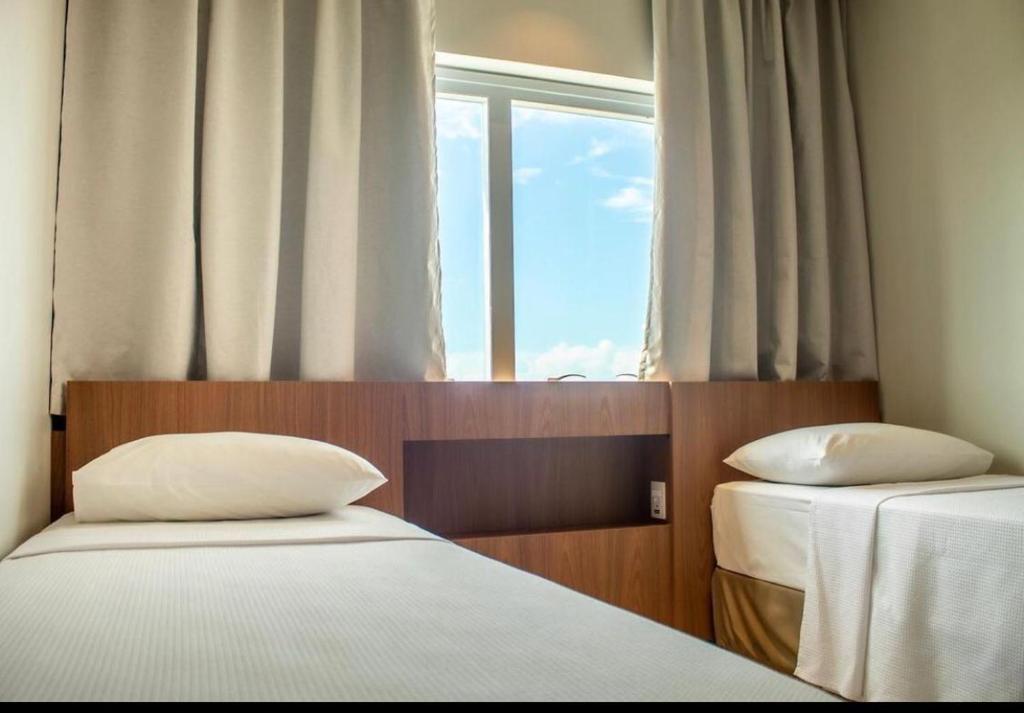 Postel nebo postele na pokoji v ubytování SALINAS EXCLUSIVE RESORT VISTA MAR 15º andar