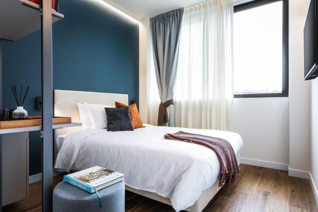 Katil atau katil-katil dalam bilik di CO99 Art Building Residence
