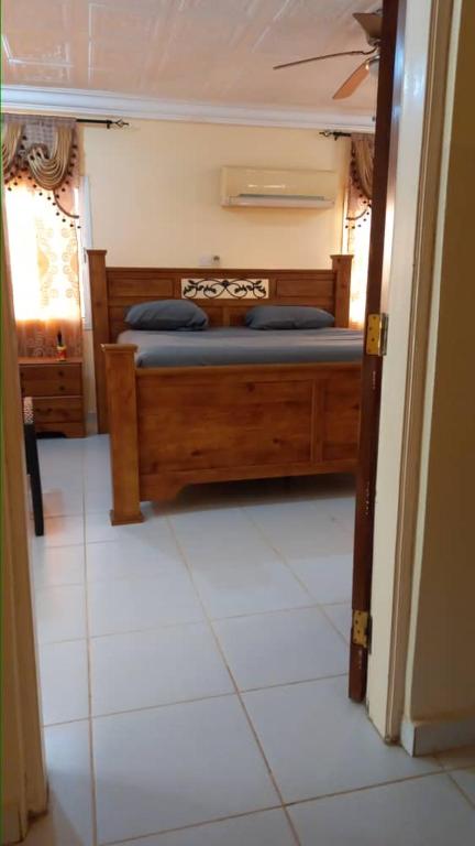 Postel nebo postele na pokoji v ubytování Gam Properties Guest House