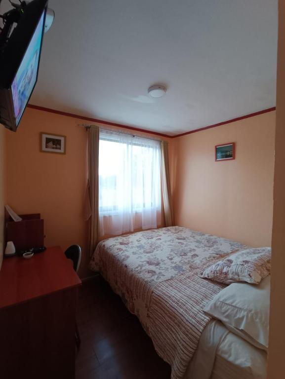 Postel nebo postele na pokoji v ubytování Bosque Valdiviano Apartment
