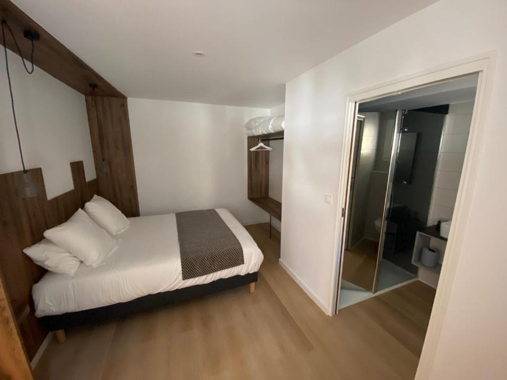 Postel nebo postele na pokoji v ubytování Hotel Restaurant Noblia