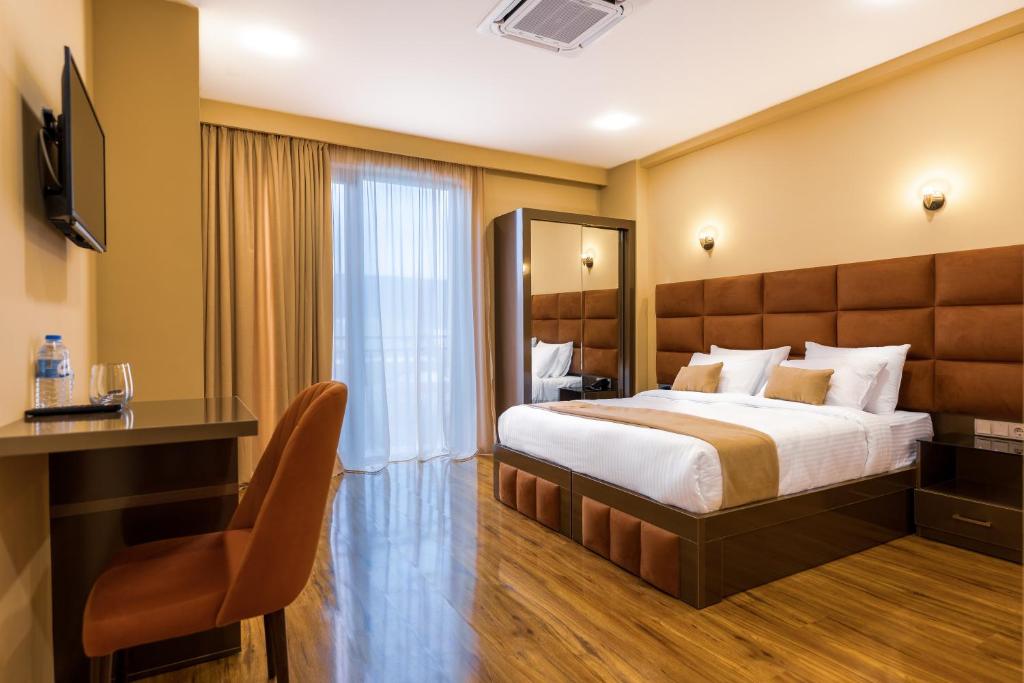 Postel nebo postele na pokoji v ubytování Hotel Residence Plaza
