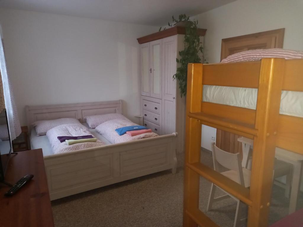 Postel nebo postele na pokoji v ubytování Penzion Domanín