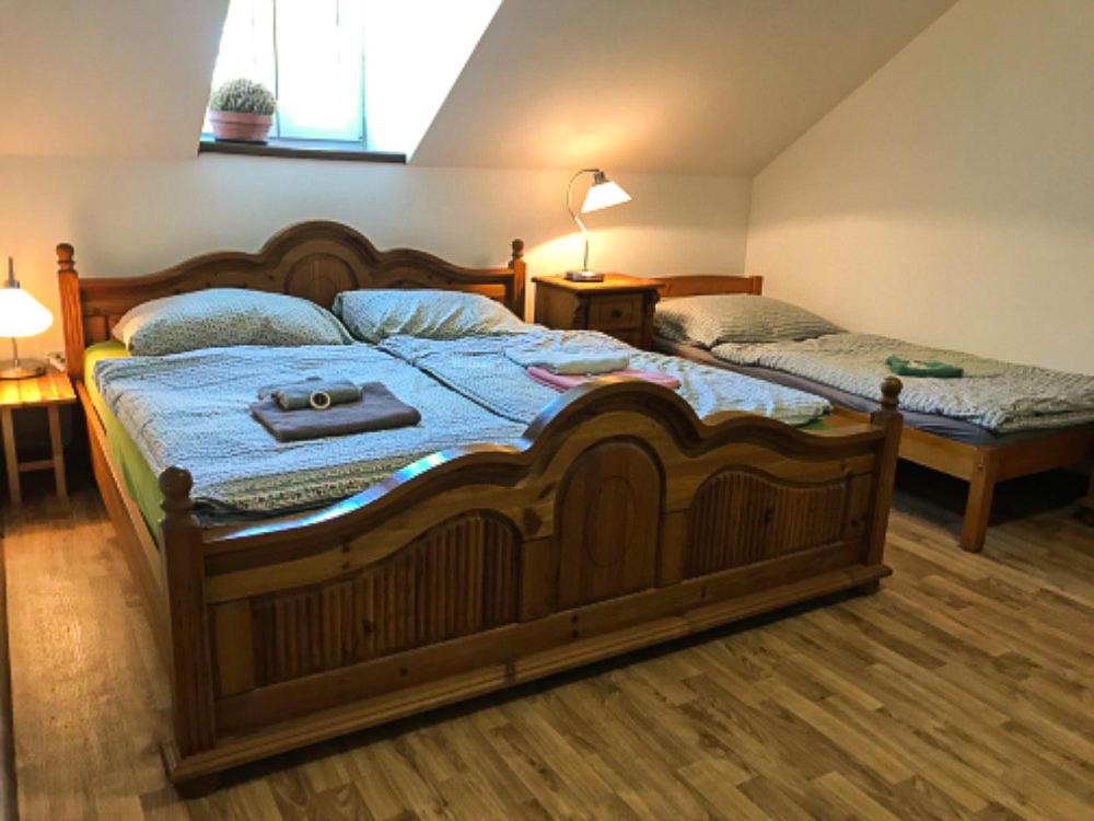 Postel nebo postele na pokoji v ubytování Penzion Domanín