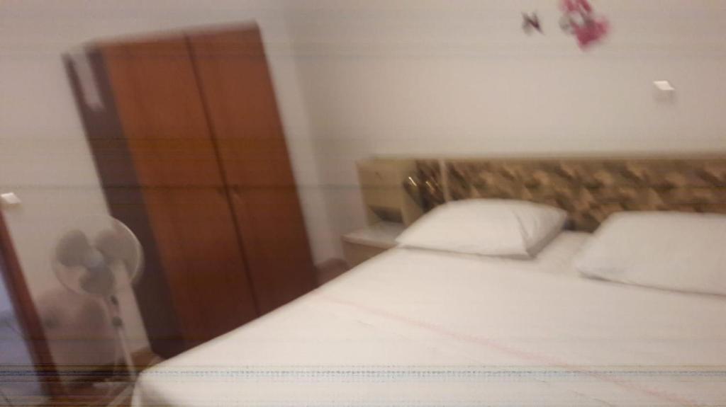 Postel nebo postele na pokoji v ubytování Apartments IVAN in Duce (900)