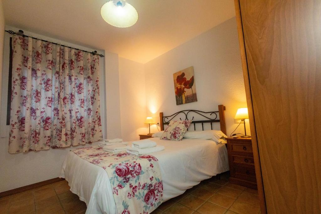 Postel nebo postele na pokoji v ubytování Casa Viola De Cazorla