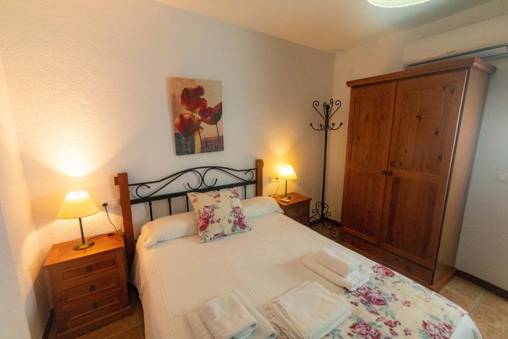 Postel nebo postele na pokoji v ubytování Casa Viola De Cazorla