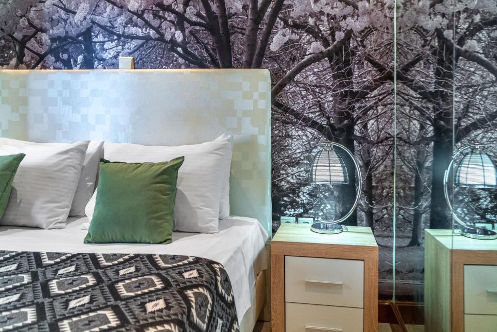 Postel nebo postele na pokoji v ubytování Zen Hotel