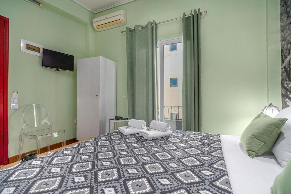 Postel nebo postele na pokoji v ubytování Zen Hotel
