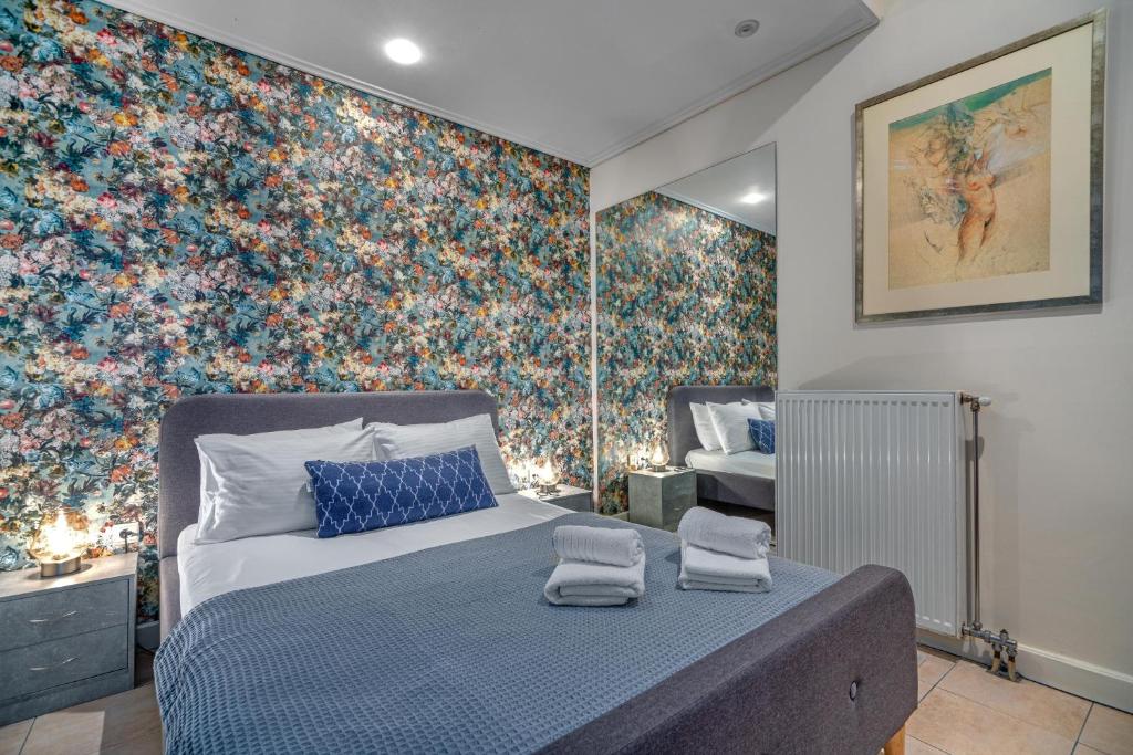 Postel nebo postele na pokoji v ubytování Zen Hotel