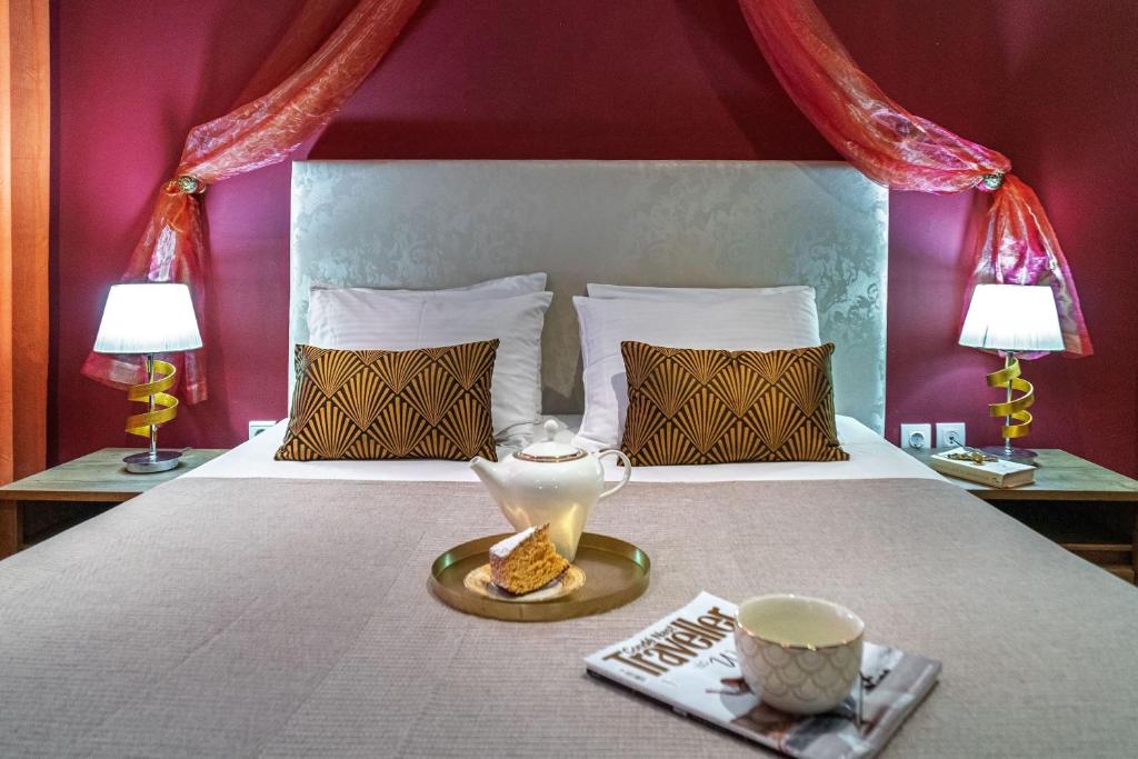 Postel nebo postele na pokoji v ubytování Zen Hotel