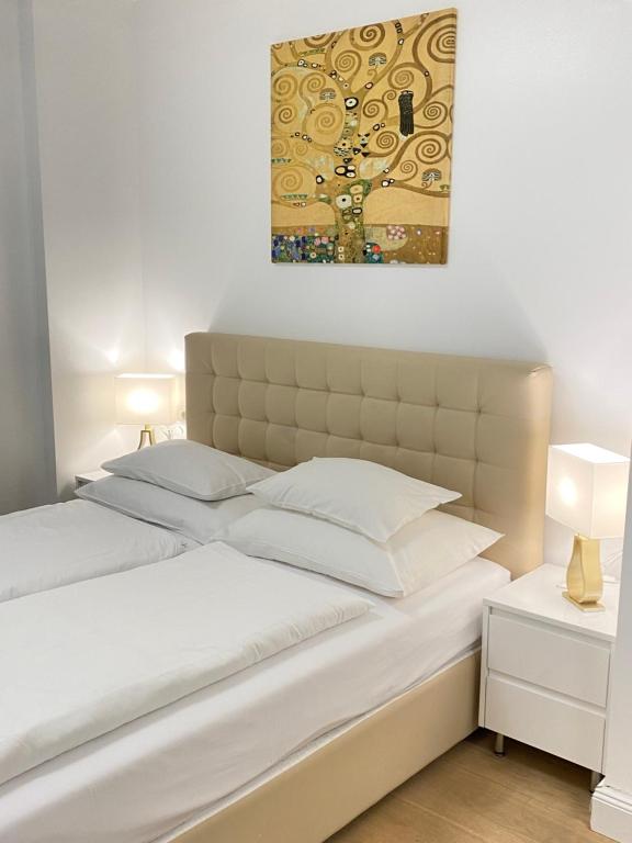 Posteľ alebo postele v izbe v ubytovaní Steiner Residences Vienna Vorgartenstrasse