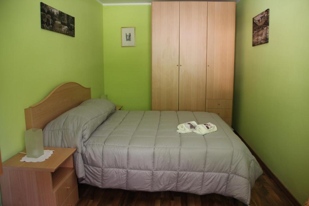 Łóżko lub łóżka w pokoju w obiekcie Ca del Nore