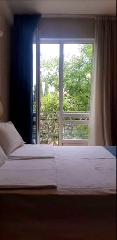 Postel nebo postele na pokoji v ubytování Hotel Lile