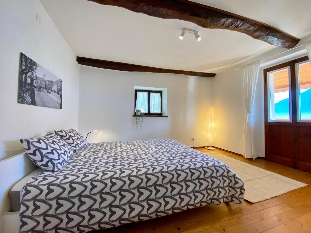 Postel nebo postele na pokoji v ubytování Casa Edi