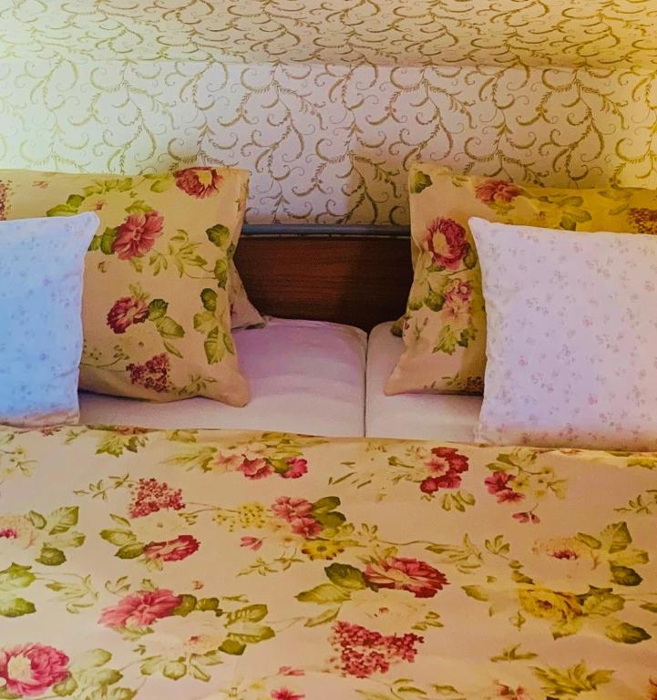 Łóżko lub łóżka w pokoju w obiekcie Hotel Penzion Trámky