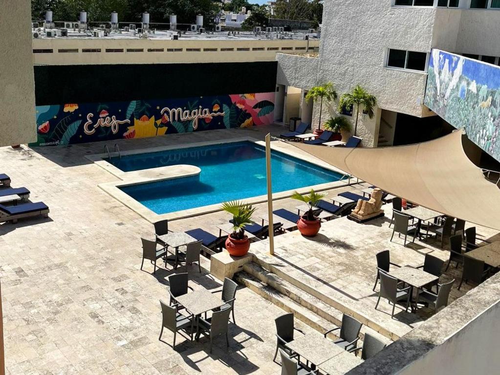 Bazén v ubytování Hotel Los Aluxes nebo v jeho okolí