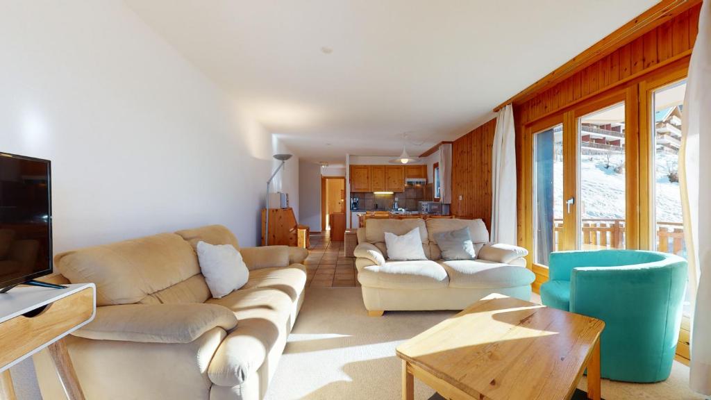 Posezení v ubytování Les Crêtes SUNNY & CENTER apartments by Alpvision Résidences