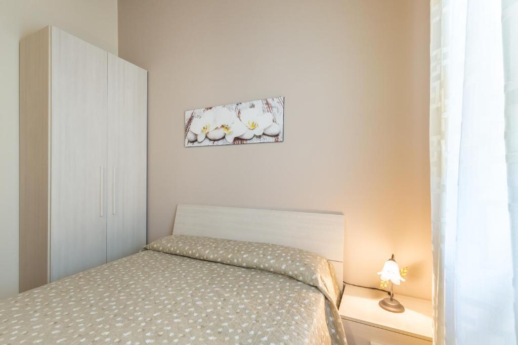 Posteľ alebo postele v izbe v ubytovaní Jasmine house near the sandy beach parking & wifi