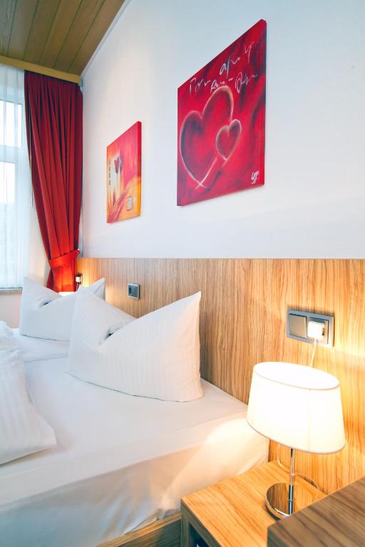 Postel nebo postele na pokoji v ubytování Hotel Schaper