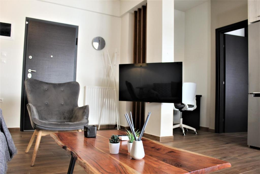 TV a/nebo společenská místnost v ubytování Khibra 3