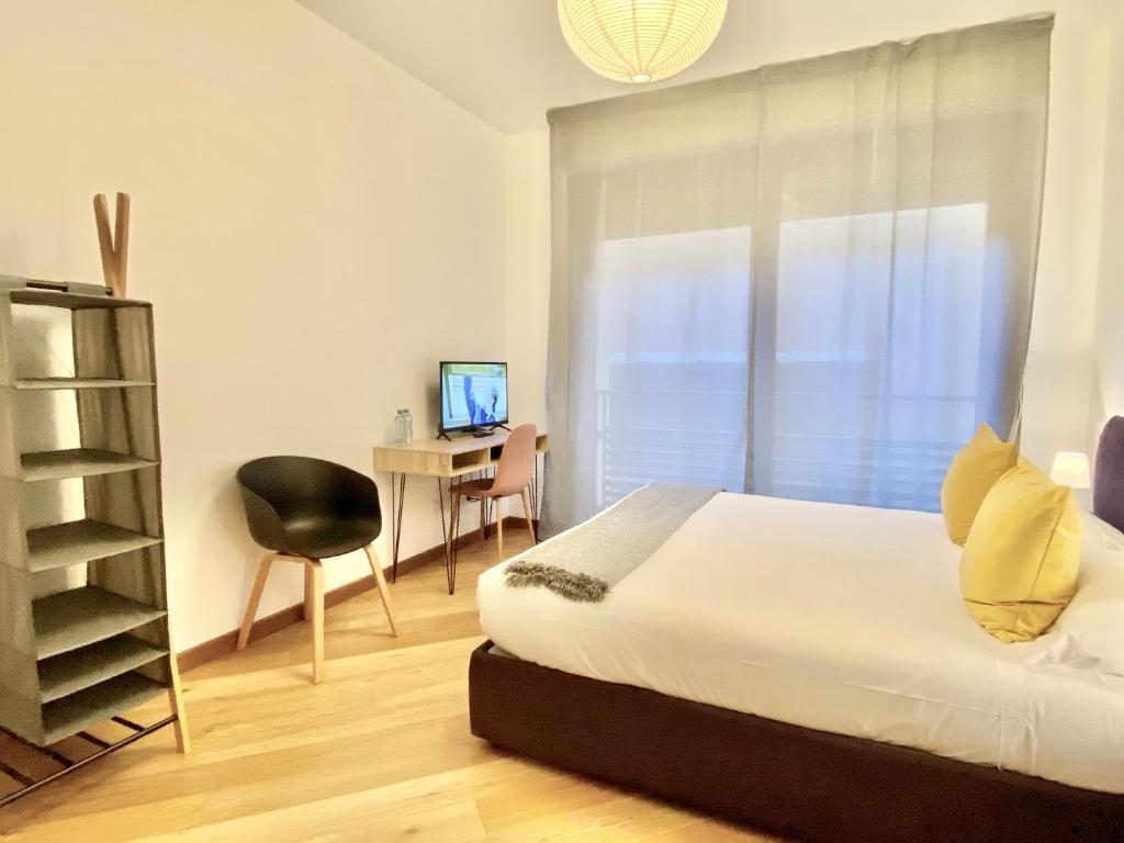 Postel nebo postele na pokoji v ubytování Palazzina B - Smart Rooms