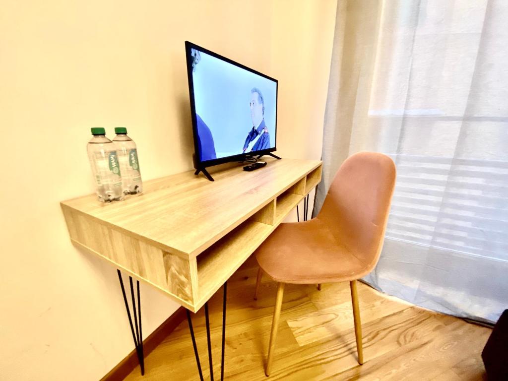 TV a/nebo společenská místnost v ubytování Palazzina B - Smart Rooms
