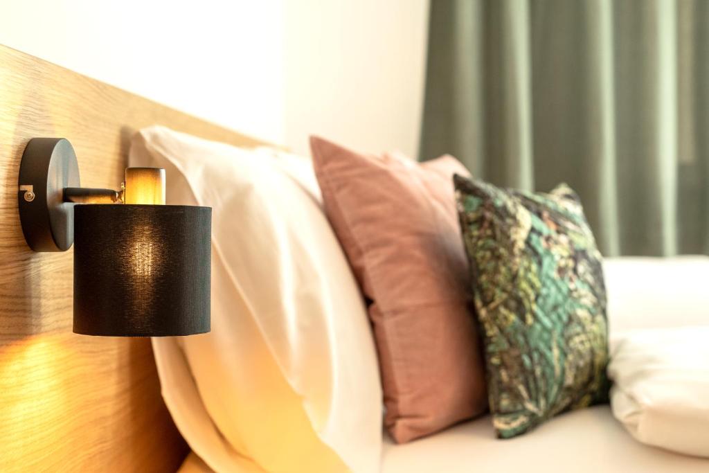 Posteľ alebo postele v izbe v ubytovaní LISAL Appartements