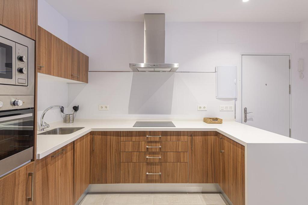 Kuchyň nebo kuchyňský kout v ubytování WintowinRentals Malaga Center, Comfortable and Renovated