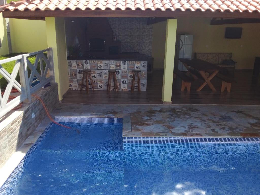 Bazén v ubytování Chacara JP nebo v jeho okolí