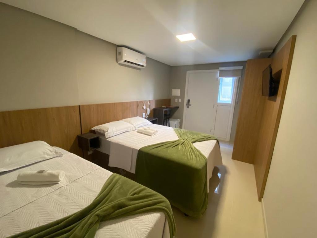  Habitación en casa particular Quarto , Capão da Canoa, Brasil  - 10 Comentarios de los clientes . ¡Reserva tu hotel ahora!