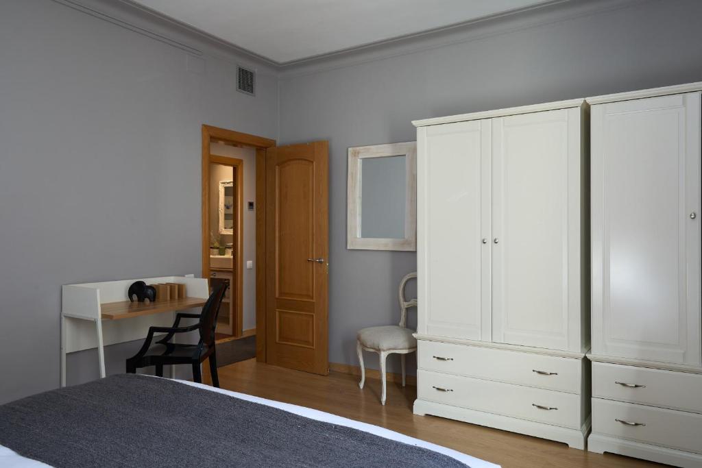 Postel nebo postele na pokoji v ubytování Casa Cosi - Casanova 5