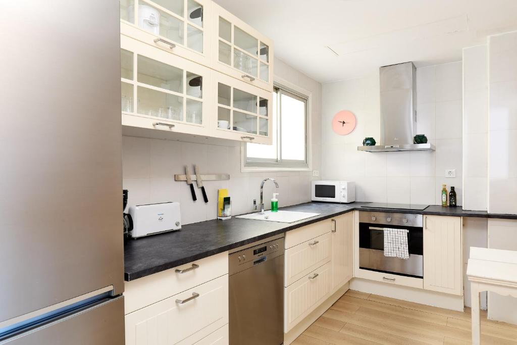 A kitchen or kitchenette at Casa Cosi - Casanova 6