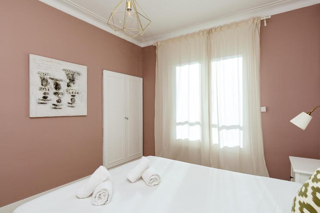 A bed or beds in a room at Casa Cosi - Casanova 6