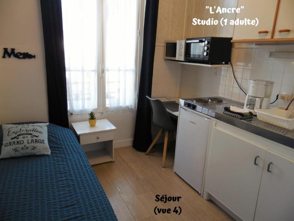 Kuchyň nebo kuchyňský kout v ubytování Résidence La Hoguette