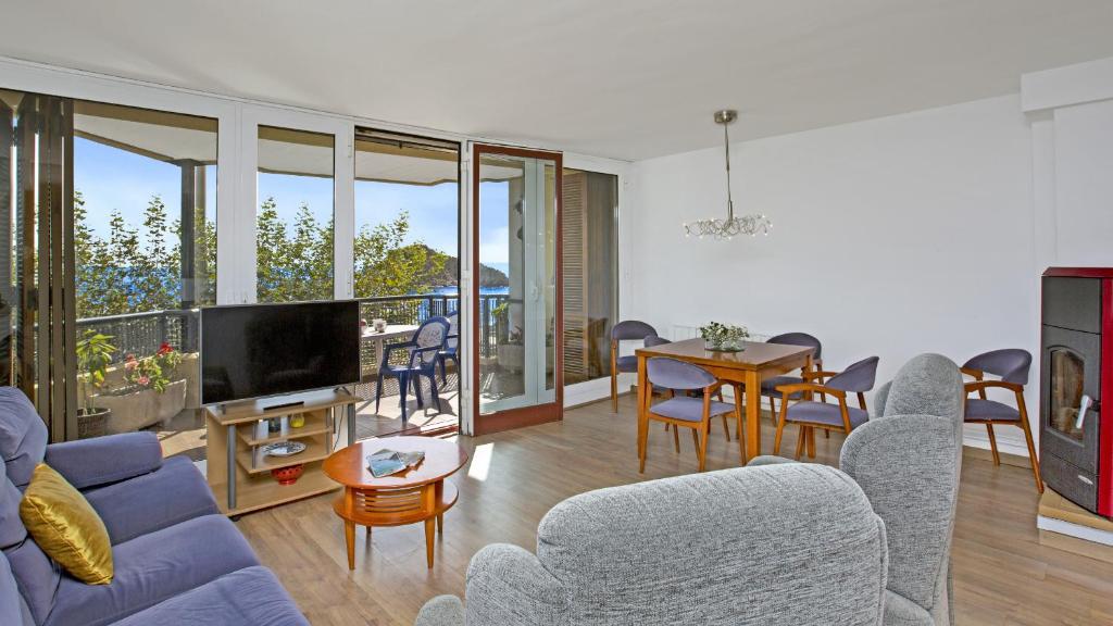Televízia a/alebo spoločenská miestnosť v ubytovaní Apartment SPal - Blanes