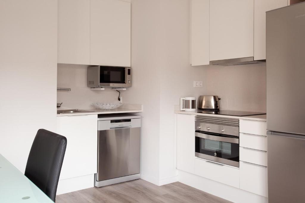 Kuchyň nebo kuchyňský kout v ubytování APBCN Eixample Center