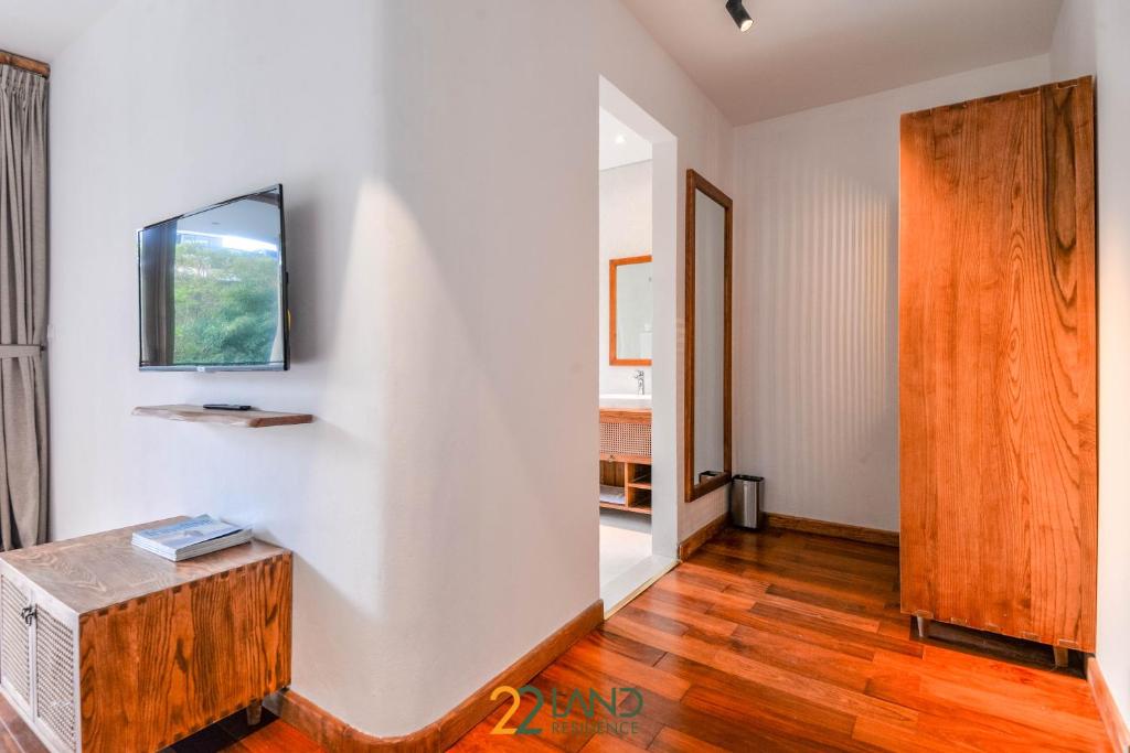 TV a/nebo společenská místnost v ubytování 22Land Hotel & Residence